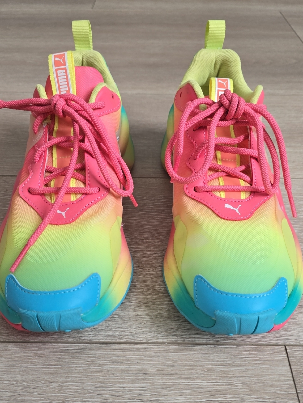 Puma x Free People Rise Movement sneakers in a vibrant tie-dye colorway